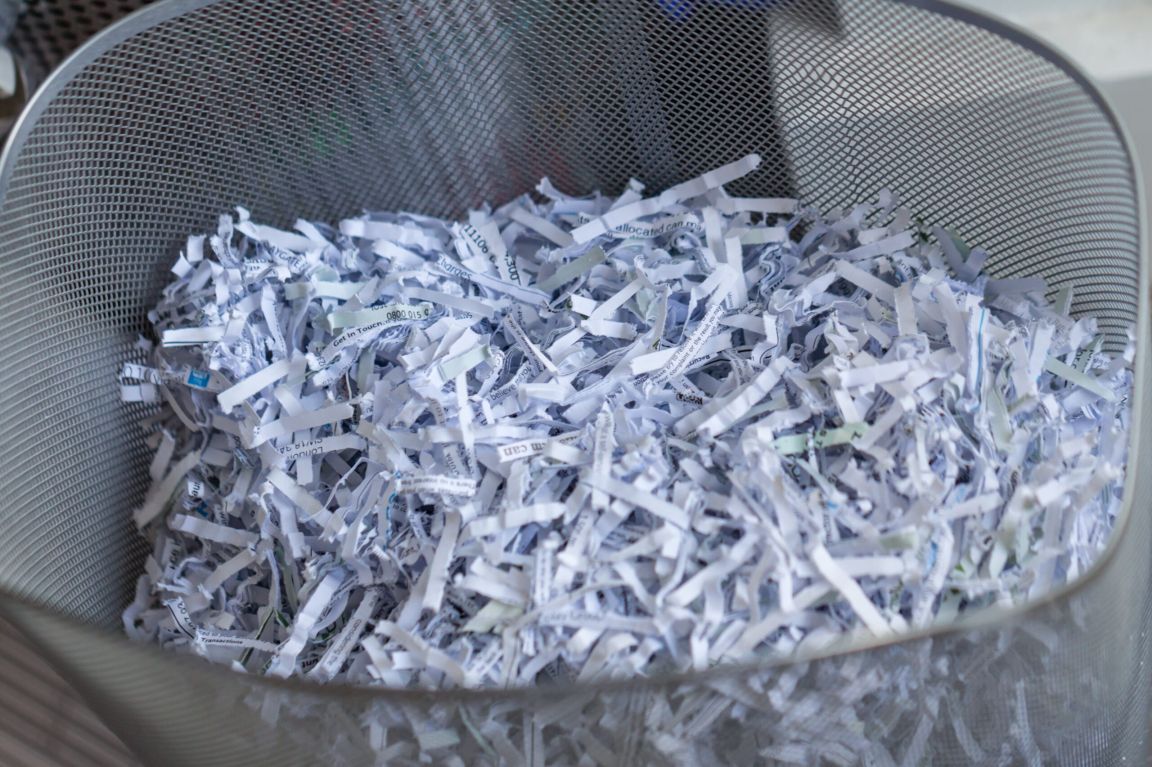 Shredded office paper in a basket